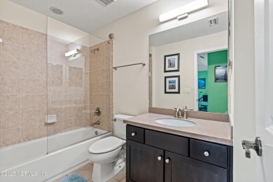 Welcome to this beautifully crafted Estaurio courtyard home by on Jacksonville Golf and Country Club in Florida - for sale on GolfHomes.com, golf home, golf lot