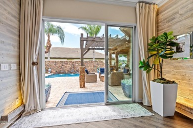 Welcome to this beautifully crafted Estaurio courtyard home by on Jacksonville Golf and Country Club in Florida - for sale on GolfHomes.com, golf home, golf lot