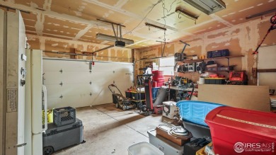 MOVE IN READY WITH GREAT NEARBY AMENATIES + NEW CARPET! This 3 on Bunker Hill Country Club in Colorado - for sale on GolfHomes.com, golf home, golf lot