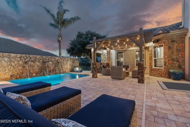 Welcome to this beautifully crafted Estaurio courtyard home by on Jacksonville Golf and Country Club in Florida - for sale on GolfHomes.com, golf home, golf lot
