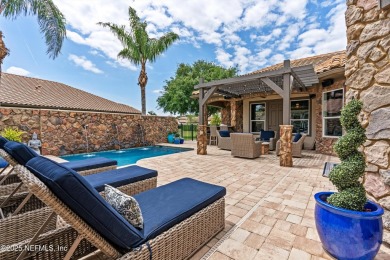 Welcome to this beautifully crafted Estaurio courtyard home by on Jacksonville Golf and Country Club in Florida - for sale on GolfHomes.com, golf home, golf lot