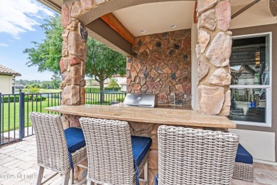 Welcome to this beautifully crafted Estaurio courtyard home by on Jacksonville Golf and Country Club in Florida - for sale on GolfHomes.com, golf home, golf lot