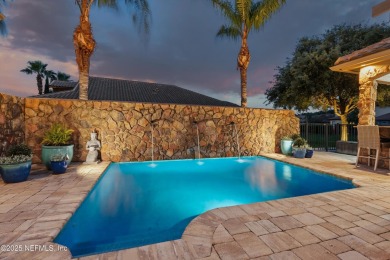 Welcome to this beautifully crafted Estaurio courtyard home by on Jacksonville Golf and Country Club in Florida - for sale on GolfHomes.com, golf home, golf lot