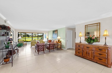 Exceptional lake and golf course views from this spacious on Quail Ridge Golf Course and Country Club in Florida - for sale on GolfHomes.com, golf home, golf lot