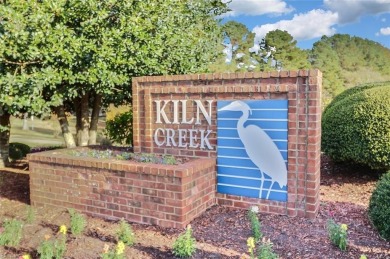 Discover the ultimate lifestyle in this sought-after golf course on Kiln Creek Golf and Country Club in Virginia - for sale on GolfHomes.com, golf home, golf lot