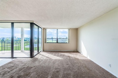 Relaxation in Paradise. The first thing to appreciate when on Isla Del Sol Yacht and Country Club in Florida - for sale on GolfHomes.com, golf home, golf lot