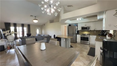 Handyman special in Cape Coral Florida. This 4-bedroom on Burnt Store Golf Club in Florida - for sale on GolfHomes.com, golf home, golf lot