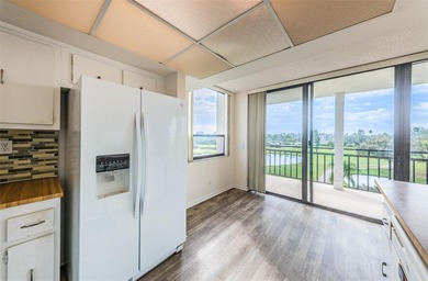 Relaxation in Paradise. The first thing to appreciate when on Isla Del Sol Yacht and Country Club in Florida - for sale on GolfHomes.com, golf home, golf lot