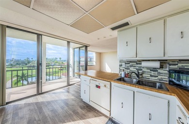 Relaxation in Paradise. The first thing to appreciate when on Isla Del Sol Yacht and Country Club in Florida - for sale on GolfHomes.com, golf home, golf lot