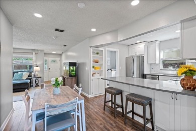 Step into this thoughtfully updated 3-bedroom, 2-bathroom home on Cove Cay Country Club in Florida - for sale on GolfHomes.com, golf home, golf lot