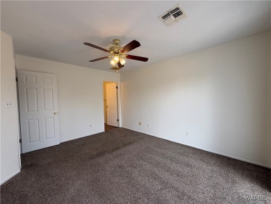 Large lot In the heart of Fort Mohave, close to Walmart, schools on Desert Lakes Golf Course in Arizona - for sale on GolfHomes.com, golf home, golf lot