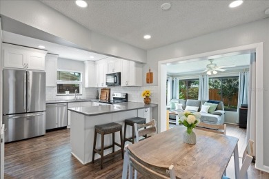Step into this thoughtfully updated 3-bedroom, 2-bathroom home on Cove Cay Country Club in Florida - for sale on GolfHomes.com, golf home, golf lot