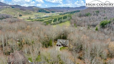 Custom-built Craftsman home at Mt. Air Golf Course offering on Mountain Aire Golf Course in North Carolina - for sale on GolfHomes.com, golf home, golf lot