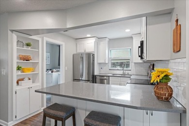 Step into this thoughtfully updated 3-bedroom, 2-bathroom home on Cove Cay Country Club in Florida - for sale on GolfHomes.com, golf home, golf lot
