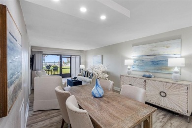 LUXURY WATERFRONT LIVING--DESIGNER FINISHES, POOL, SUNSET AND on Isla Del Sol Yacht and Country Club in Florida - for sale on GolfHomes.com, golf home, golf lot
