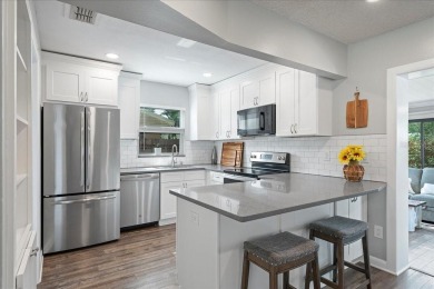Step into this thoughtfully updated 3-bedroom, 2-bathroom home on Cove Cay Country Club in Florida - for sale on GolfHomes.com, golf home, golf lot