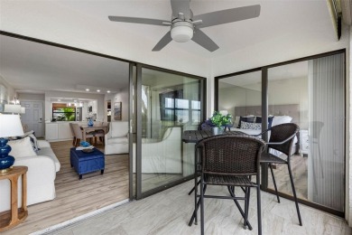 LUXURY WATERFRONT LIVING--DESIGNER FINISHES, POOL, SUNSET AND on Isla Del Sol Yacht and Country Club in Florida - for sale on GolfHomes.com, golf home, golf lot