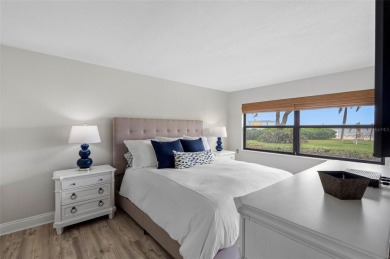 LUXURY WATERFRONT LIVING--DESIGNER FINISHES, POOL, SUNSET AND on Isla Del Sol Yacht and Country Club in Florida - for sale on GolfHomes.com, golf home, golf lot