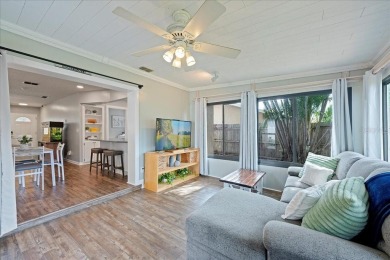 Step into this thoughtfully updated 3-bedroom, 2-bathroom home on Cove Cay Country Club in Florida - for sale on GolfHomes.com, golf home, golf lot
