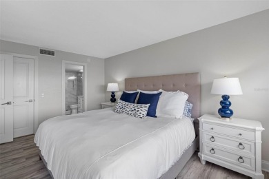 LUXURY WATERFRONT LIVING--DESIGNER FINISHES, POOL, SUNSET AND on Isla Del Sol Yacht and Country Club in Florida - for sale on GolfHomes.com, golf home, golf lot