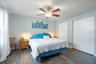 Step into this thoughtfully updated 3-bedroom, 2-bathroom home on Cove Cay Country Club in Florida - for sale on GolfHomes.com, golf home, golf lot
