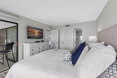 LUXURY WATERFRONT LIVING--DESIGNER FINISHES, POOL, SUNSET AND on Isla Del Sol Yacht and Country Club in Florida - for sale on GolfHomes.com, golf home, golf lot