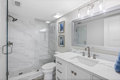 LUXURY WATERFRONT LIVING--DESIGNER FINISHES, POOL, SUNSET AND on Isla Del Sol Yacht and Country Club in Florida - for sale on GolfHomes.com, golf home, golf lot
