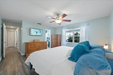 Step into this thoughtfully updated 3-bedroom, 2-bathroom home on Cove Cay Country Club in Florida - for sale on GolfHomes.com, golf home, golf lot