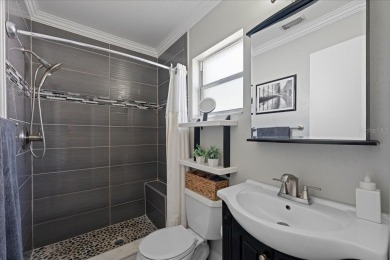 Step into this thoughtfully updated 3-bedroom, 2-bathroom home on Cove Cay Country Club in Florida - for sale on GolfHomes.com, golf home, golf lot