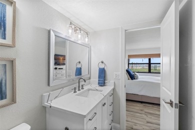 LUXURY WATERFRONT LIVING--DESIGNER FINISHES, POOL, SUNSET AND on Isla Del Sol Yacht and Country Club in Florida - for sale on GolfHomes.com, golf home, golf lot