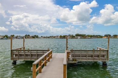 Welcome to your coastal paradise at this exquisite Treasure on Treasure Bay Golf and Tennis in Florida - for sale on GolfHomes.com, golf home, golf lot