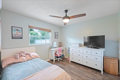 Step into this thoughtfully updated 3-bedroom, 2-bathroom home on Cove Cay Country Club in Florida - for sale on GolfHomes.com, golf home, golf lot