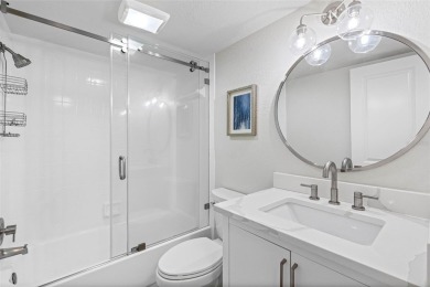 LUXURY WATERFRONT LIVING--DESIGNER FINISHES, POOL, SUNSET AND on Isla Del Sol Yacht and Country Club in Florida - for sale on GolfHomes.com, golf home, golf lot