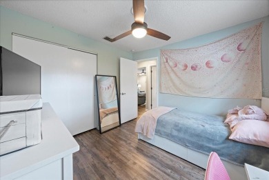 Step into this thoughtfully updated 3-bedroom, 2-bathroom home on Cove Cay Country Club in Florida - for sale on GolfHomes.com, golf home, golf lot