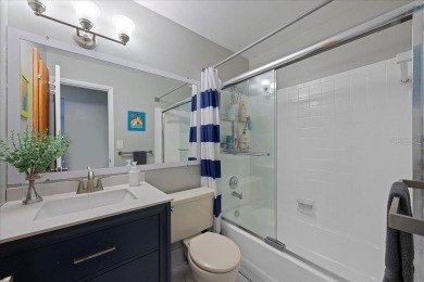 Step into this thoughtfully updated 3-bedroom, 2-bathroom home on Cove Cay Country Club in Florida - for sale on GolfHomes.com, golf home, golf lot