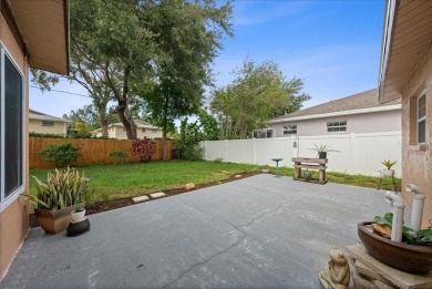 Step into this thoughtfully updated 3-bedroom, 2-bathroom home on Cove Cay Country Club in Florida - for sale on GolfHomes.com, golf home, golf lot