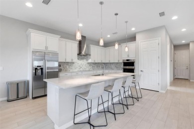 Discover resort-style living in this stunning 5-bedroom, 4-bath on IMG Academies Golf and Country Club in Florida - for sale on GolfHomes.com, golf home, golf lot