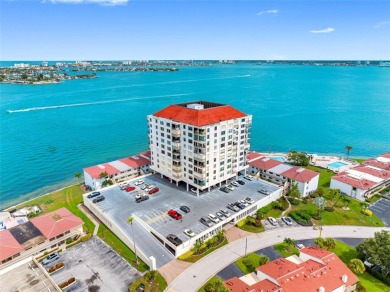 LUXURY WATERFRONT LIVING--DESIGNER FINISHES, POOL, SUNSET AND on Isla Del Sol Yacht and Country Club in Florida - for sale on GolfHomes.com, golf home, golf lot