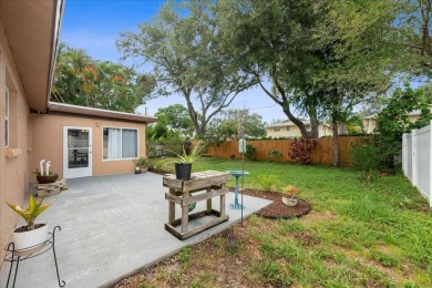 Step into this thoughtfully updated 3-bedroom, 2-bathroom home on Cove Cay Country Club in Florida - for sale on GolfHomes.com, golf home, golf lot