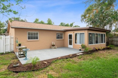 Step into this thoughtfully updated 3-bedroom, 2-bathroom home on Cove Cay Country Club in Florida - for sale on GolfHomes.com, golf home, golf lot