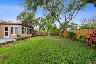 Step into this thoughtfully updated 3-bedroom, 2-bathroom home on Cove Cay Country Club in Florida - for sale on GolfHomes.com, golf home, golf lot