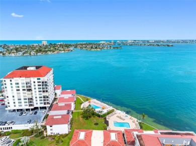 LUXURY WATERFRONT LIVING--DESIGNER FINISHES, POOL, SUNSET AND on Isla Del Sol Yacht and Country Club in Florida - for sale on GolfHomes.com, golf home, golf lot