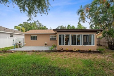 Step into this thoughtfully updated 3-bedroom, 2-bathroom home on Cove Cay Country Club in Florida - for sale on GolfHomes.com, golf home, golf lot