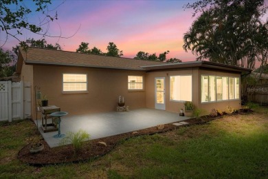 Step into this thoughtfully updated 3-bedroom, 2-bathroom home on Cove Cay Country Club in Florida - for sale on GolfHomes.com, golf home, golf lot