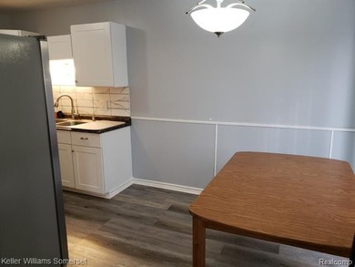 Beautiful updated 2 bed, 1.5 bath condo in convenient Clinton on Fern Hill Country Club in Michigan - for sale on GolfHomes.com, golf home, golf lot