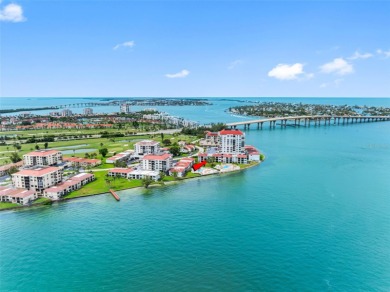 LUXURY WATERFRONT LIVING--DESIGNER FINISHES, POOL, SUNSET AND on Isla Del Sol Yacht and Country Club in Florida - for sale on GolfHomes.com, golf home, golf lot
