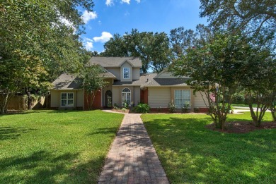 Welcome home to Windlake! This wonderful two-story home in the on Bluewater Bay Resort in Florida - for sale on GolfHomes.com, golf home, golf lot