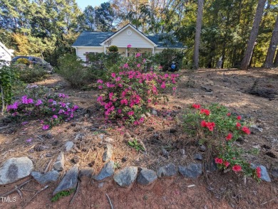 Welcome to your home. Discover this comfortable and cozy Ranch on River Golf and County Club at Lake Royale in North Carolina - for sale on GolfHomes.com, golf home, golf lot