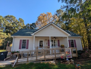 Welcome to your home. Discover this comfortable and cozy Ranch on River Golf and County Club at Lake Royale in North Carolina - for sale on GolfHomes.com, golf home, golf lot