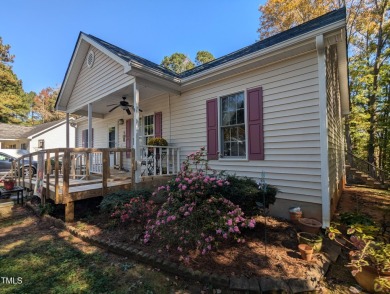 Welcome to your home. Discover this comfortable and cozy Ranch on River Golf and County Club at Lake Royale in North Carolina - for sale on GolfHomes.com, golf home, golf lot